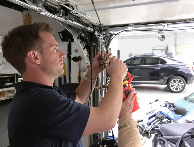 Hialeah Garage Door Repair safety certified technician performing cable replacement in Hialeah
