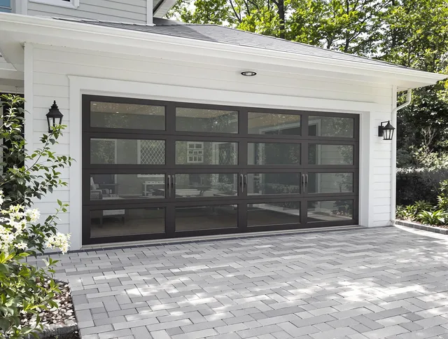 Hialeah Garage Door Repair design specialist presenting custom garage door options to Hialeah homeowner