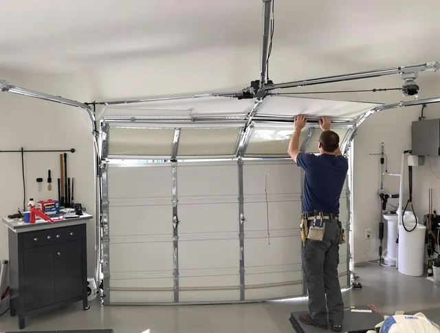 Hialeah Garage Door Repair specialist performing precise section replacement on Hialeah garage door