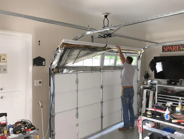 Garage door section replacement by Hialeah Garage Door Repair in Hialeah